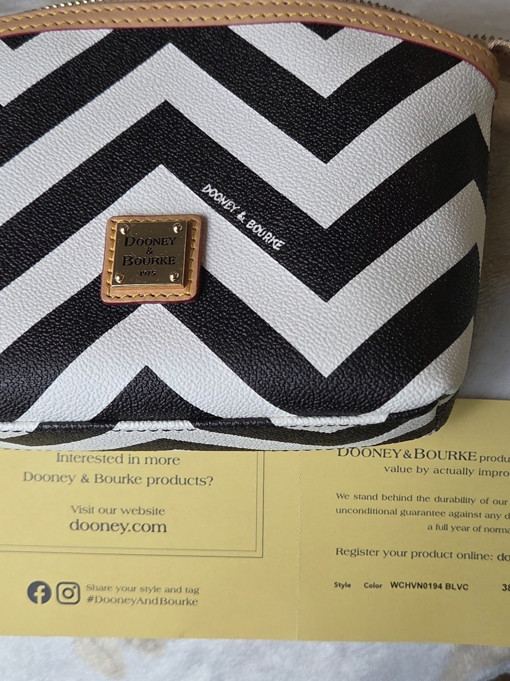 Dooney & Bourke Black and White Chevron Cosmetic Pouch with Gold Plaque